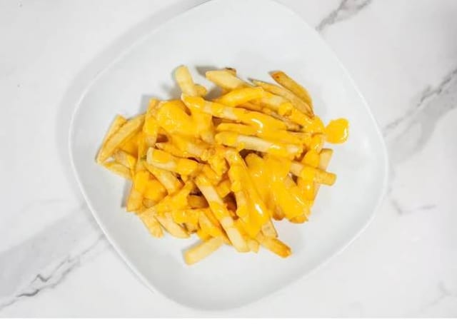 Papas Con Queso / Cheese Fries.